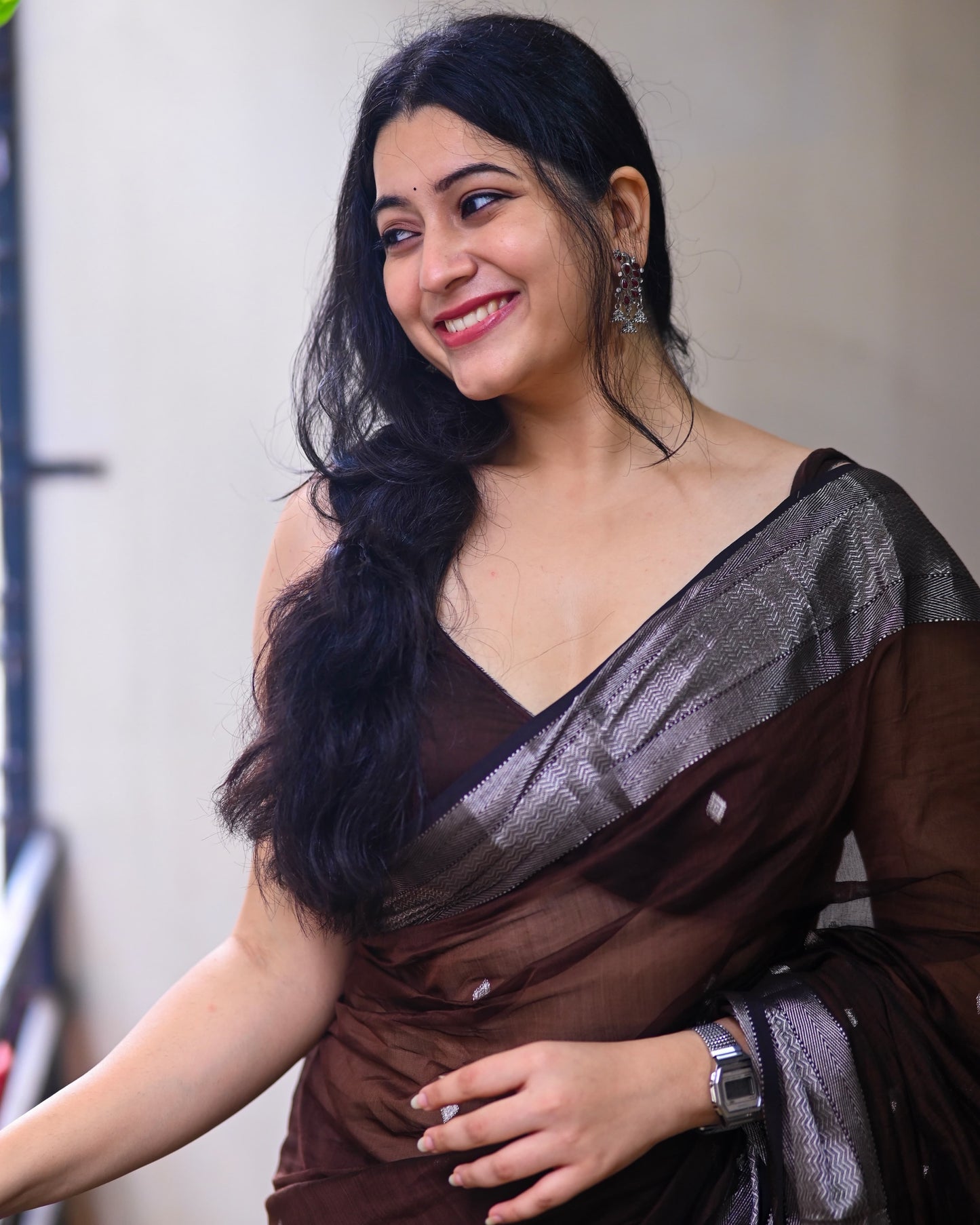 Presenting the Maheshwari Handwoven Silver Buti Saree in Brown Colour