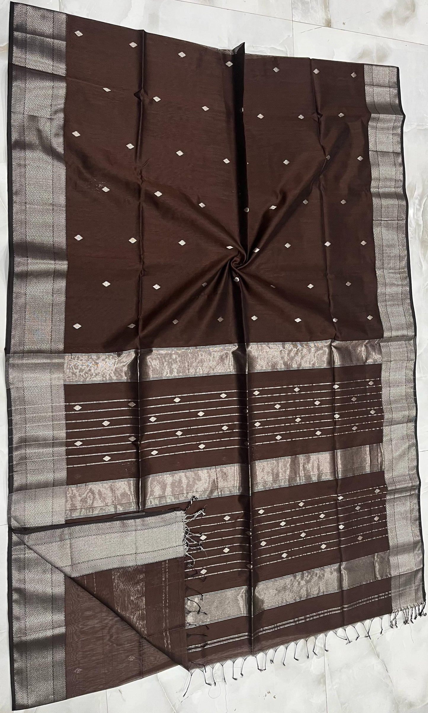 Presenting the Maheshwari Handwoven Silver Buti Saree in Brown Colour